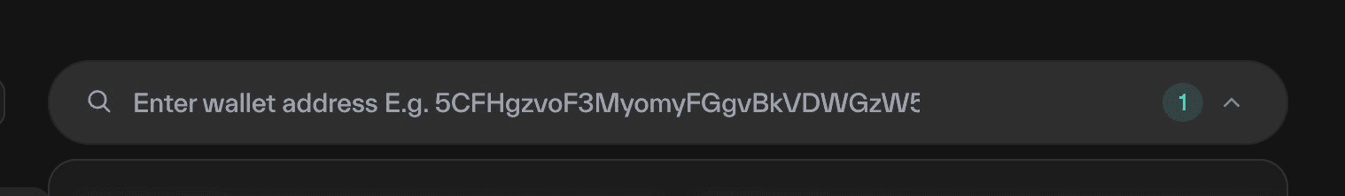 Taostats Pro mining search bar prompting for a coldkey wallet address, with a "1" counter badge and an expand chevron